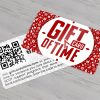 Example of a 20pt Plastic Business Card that says 'Gift Card of Time' with christmas decoration in the background. This is a product printed by netfishes in Carthage, MO