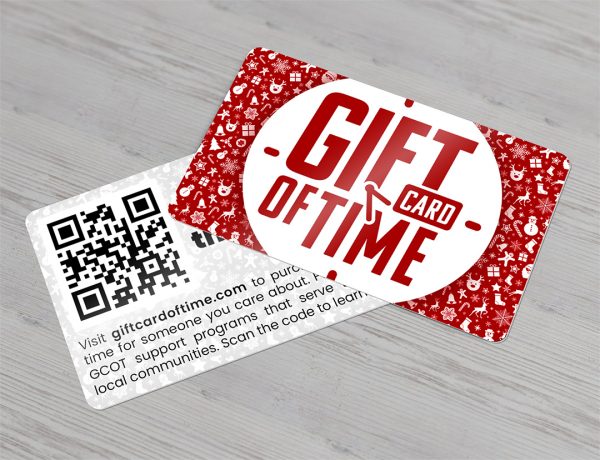 Example of a 20pt Plastic Business Card that says 'Gift Card of Time' with christmas decoration in the background. This is a product printed by netfishes in Carthage, MO